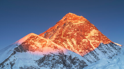 burning light of sun on the walls of Everest mount in Nepal