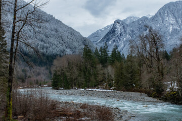 Cold Skykomish River Flows Out of Snowy Cascades Near Index Washington