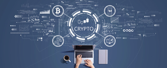 Crypto Trading theme with person working with a laptop