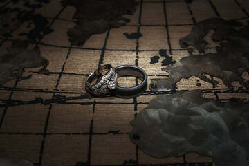 Wedding rings on map close to Europe © Adam