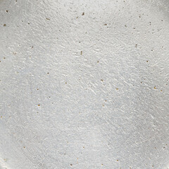 Silver aluminum metal closeup background texture with scratches and spots 