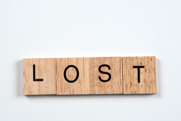 wood blocks with word lost