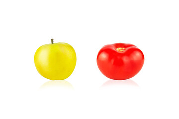 Red tomato and yellow apple with stem isolated on white background