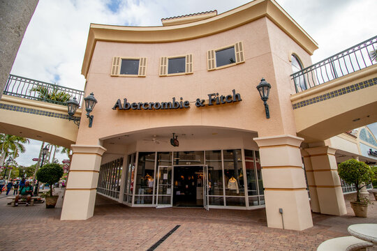 Estero, FL USA - 2-10-2022: Shoppers walk past the facade of Abercrombie & Fitch Clothing Store in Miromar Outlets. an American lifestyle retailer that focuses on casual wear.