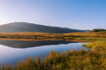 A peaceful early Summer's morning at Tewet Tarn and St. John's-in-the-Vale, Lake District, Cumbria, UK