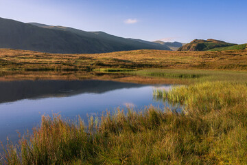 A peaceful early Summer's morning at Tewet Tarn and St John's-in-the-Vale, Lake District, Cumbria, UK