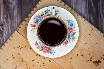 A cup of coffee on a rustic surface
