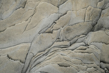 Light gray rough grainy stone texture background. High quality photo
