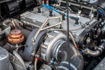 Big turbo on display under the bonnet of performance car