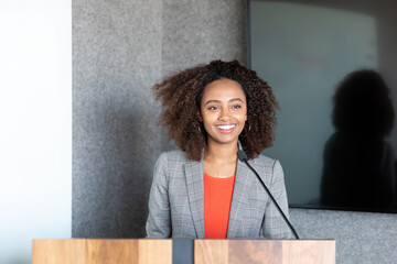 Woman speaking in a conference room