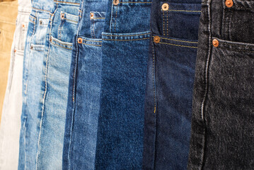 jeans of different textures and different shades. full frame.