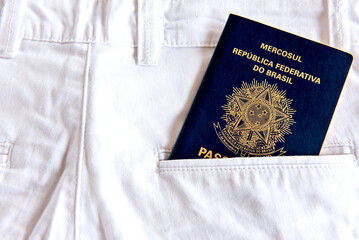 Brazilian pass card in white jeans pocket.