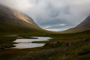 Sunrise in the U-valley on a rainy day, Kungsleden trail, Swedish Lapland © Alena V