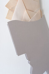 stylized shape and folded blank paper