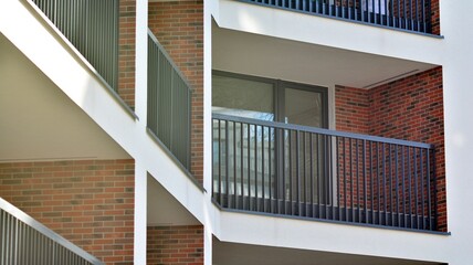 Abstract architecture, fragment of modern urban geometry,. Modern apartment building on a sunny day with a blue sky,. European residential apartment buildings.