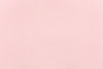 Soft pink pastel cement wall texture for background.