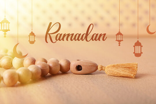 Greeting card for Ramadan with wooden Muslim prayer beads