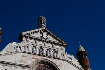 Cremona Cathedral in Cremona, Lombardy is a Catholic church in northern Italy with the white marble statues, the bell tower (Torrazzo) and the seat of the Bishop of Cremona. European architecture.