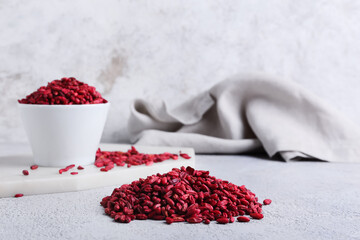 Dried barberries on light background