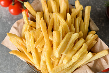 Tasty french fries on table, closeup