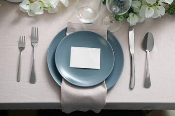 Stylish table setting with blank card