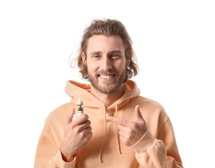 Handsome young man with vape mod on white background