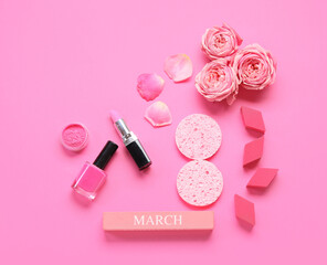 Obraz na płótnie Canvas Composition with cosmetic products, flowers, sponges and word MARCH for International Women's Day celebration on pink background