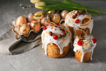 Delicious Easter cake on grey background