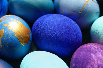 Multicolored Easter eggs as background, closeup