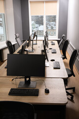 Many modern computers in open space office