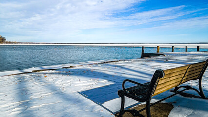 Fototapeta na wymiar Scenic lakefront view over icy waters