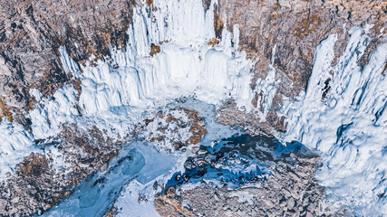 Fototapeta na wymiar Beautiful ice formations on rock walls