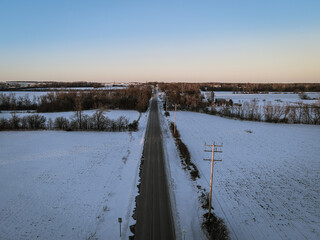 Winter road through the landscape