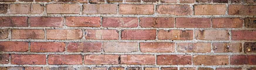 Red brick wall background for web banner.