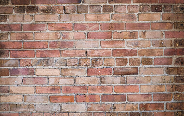 Red brick wall background with grunge texture.