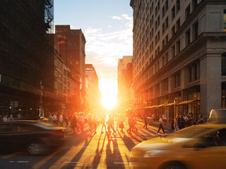 Crowds of people and cars in the busy intersection on 23rd Street and 5th Avenue in New York City with sunlight in the background - 487472806