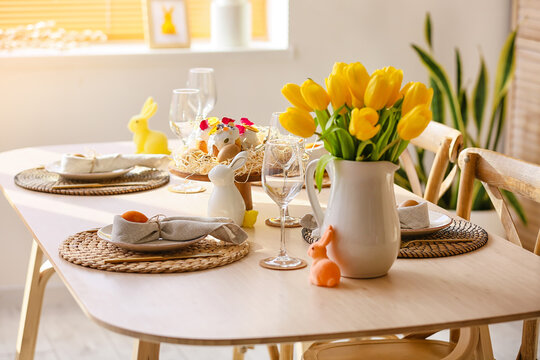 Beautiful dinnerware on table served for Easter celebration