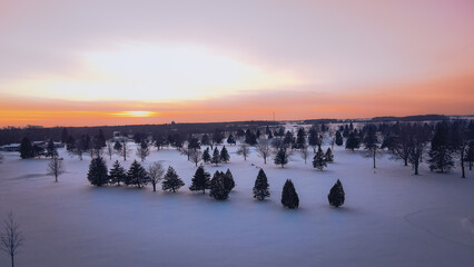 Winter sunset over snow landscape