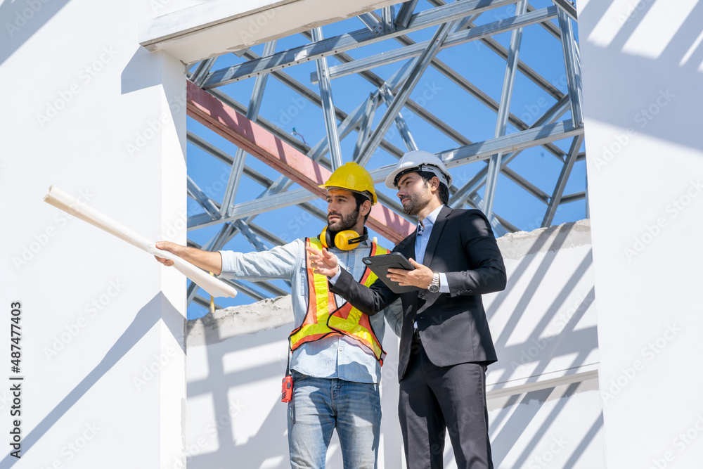 Poster architect and engineer foreman in helmet working on a building site,civil engineer project construct