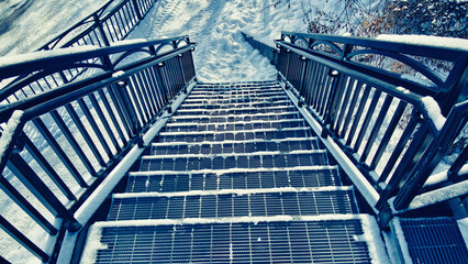 Snow covered urban stairs with snow