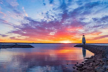 Poster Sunset beautiful afterglow over the lighthouse of Lake Hefner © Kit Leong