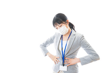 腹痛に苦しむ若いビジネスパーソン