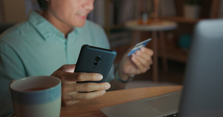 man online shopping with card