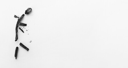 Completely burnt out match showing person on white background. Emotional burnout concept