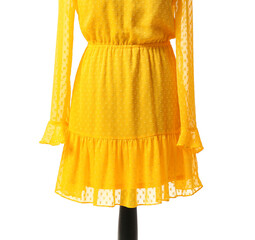 Mannequin with stylish yellow dress on white background, closeup
