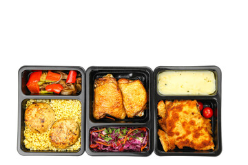 Lunch boxes with different food on white background
