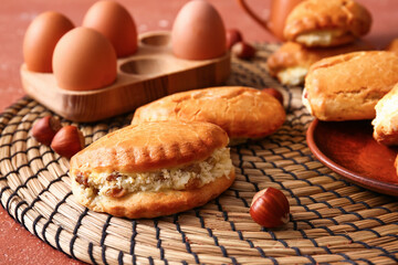 Tasty sochniki with cottage cheese on table