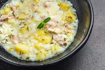 soup chicken meat vegetable broth and rice fresh healthy meal food diet still life snack on the table copy space food background rustic 