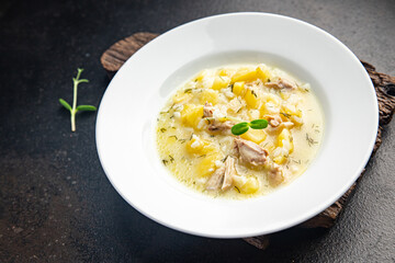 soup chicken meat vegetable broth and rice fresh healthy meal food diet still life snack on the table copy space food background rustic 