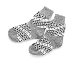 Pair of knitted socks on white background